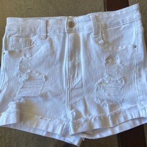 white jean shorts with rips never worn